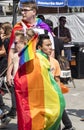 2018: Young boys wearing rainbow flags attending the Gay Pride parade also known as Christopher Street Day CSD in Munich, German