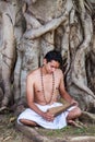 Young brahmin reads scripture