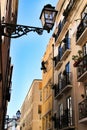 Young bricklayer climber doing repair work in a facade of Lisbon