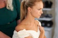 Getting ready for the big day. A young bride getting her hair done before the wedding. Royalty Free Stock Photo
