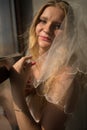 Young bride girl in lingerie and lace veil Royalty Free Stock Photo