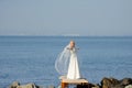Young bride near the sea coast