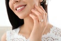 Young bride wearing beautiful engagement ring