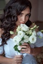 Young bride in a white dress with makeup and hair, close-up. Ideal woman. Wedding day. Gorgeous bride. Marriage. Royalty Free Stock Photo