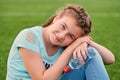 A young bright girl loves sports.closeup portrait of young girl holding clean water.