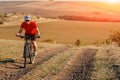 Young bright man on mountain bike riding in autumn landscape Royalty Free Stock Photo