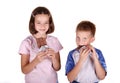 Young brother eat bar of chocolate Royalty Free Stock Photo