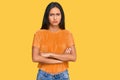 Young brunette arab woman wearing casual clothes skeptic and nervous, disapproving expression on face with crossed arms Royalty Free Stock Photo