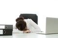 Young brunette businesswoman fall asleep on desk
