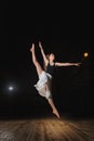 Young brunette dancer girl in split jump Royalty Free Stock Photo