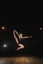 Young brunette dancer girl in split jump Royalty Free Stock Photo