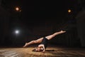 Young brunette dancer girl in split Royalty Free Stock Photo