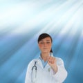 Young brunette doctor pointing Royalty Free Stock Photo