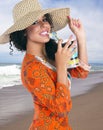 Young brunette female on the beach Royalty Free Stock Photo