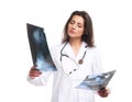 A young brunette female doctor with an x-ray Royalty Free Stock Photo