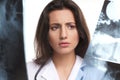 A young brunette female doctor with an xray Royalty Free Stock Photo