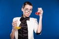 Young brunette with flasks Royalty Free Stock Photo