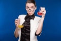 Young brunette with flasks Royalty Free Stock Photo