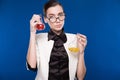 Young brunette with flasks Royalty Free Stock Photo