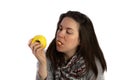 young brunette girl eating an apple Royalty Free Stock Photo