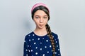 Young brunette girl wearing elegant look depressed and worry for distress, crying angry and afraid Royalty Free Stock Photo