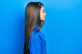 Young brunette girl wearing turtleneck sweater looking to side, relax profile pose with natural face and confident smile