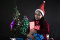 Portrait of young and attractive Indian Bengali brunette woman in woolen clothes in Christmas. Royalty Free Stock Photo