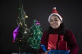 Portrait of young and attractive Indian Bengali brunette woman in woolen clothes in Christmas. Royalty Free Stock Photo