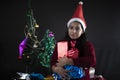 Portrait of young and attractive Indian Bengali brunette woman in woolen clothes in Christmas. Royalty Free Stock Photo