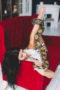 Young brunette with a snake python Royalty Free Stock Photo