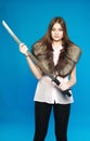 Young brunette standing with a sword in hand Royalty Free Stock Photo