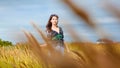 Young brunette woman on autumn field
