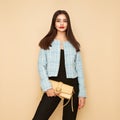 Young brunette woman in blue jacket Royalty Free Stock Photo