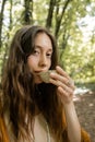 Young brunette woman drinking tea from Royalty Free Stock Photo