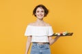 Young brunette woman girl in casual clothes hold in hand makizushi sushi roll served on black plate traditional japanese Royalty Free Stock Photo