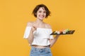 Young brunette woman girl in casual clothes hold in hand makizushi sushi roll served on black plate traditional japanese Royalty Free Stock Photo