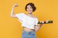 Young brunette woman girl in casual clothes hold in hand makizushi sushi roll served on black plate traditional japanese Royalty Free Stock Photo