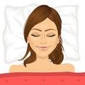 Young brunette woman sleeping in bed at home Royalty Free Stock Photo