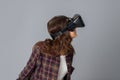 Young brunette woman testing virtual reality helmet Royalty Free Stock Photo