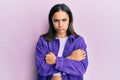 Young brunette woman wearing casual clothes skeptic and nervous, disapproving expression on face with crossed arms Royalty Free Stock Photo