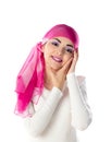 Young brunette woman wearing pink head scarf