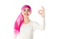 Young brunette woman wearing pink head scarf Royalty Free Stock Photo