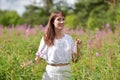 Young brunette woman in white dress Royalty Free Stock Photo