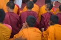 Young Buddhist Monks, back of the head view.