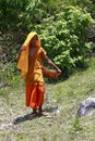 Young Buddhist monks in a garden, Phnom Penh, Cambodia Royalty Free Stock Photo