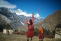 Young Buddhist monks playing frisbee Royalty Free Stock Photo