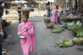 Buddhist novice nuns collecting morning alms