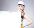 Young builder craftswoman construction worker, empty frame Royalty Free Stock Photo