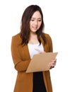 Young Buisnesswoman write on clipboard Royalty Free Stock Photo