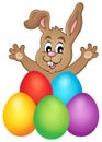 Young bunny with Easter eggs theme 1 Royalty Free Stock Photo
